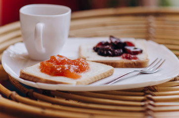 two sweet toast with fruit jam. closeup