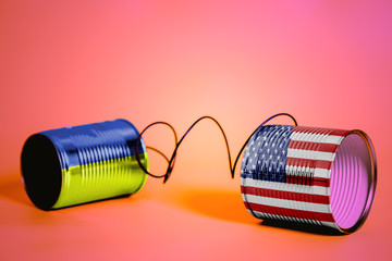 tin can phone with USA and Ukraine Flags.communication concept