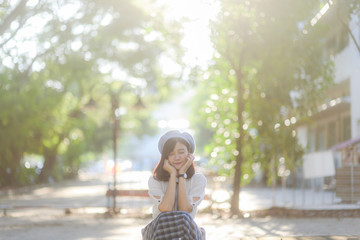 Portrait of cute female smile in the garden. happy beautiful Asian woman