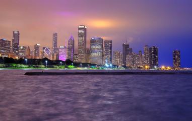 Obraz premium Chicago, Illinois, USA - June 22, 2018 - The Chicago skyline at night after a storm across Lake Michigan.