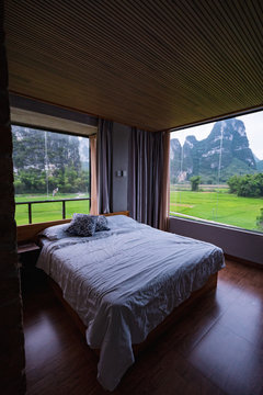 Elegant bedroom with view of Chinese mountains