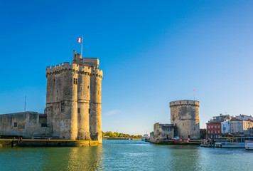 Port of La rochelle guarded by tour de la chaine and tour Saint Nicholas, France