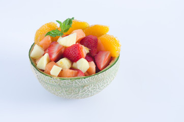 Melon stuffed with various fruits.