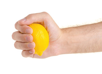 Lemon in hand on a white background isolation