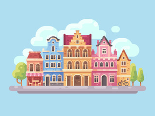 Fototapeta premium Bright city street with old buildings and cafes flat illustration. European city background.