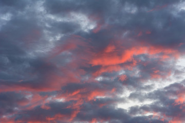 Fototapeta na wymiar Background of the evening sky and amazing clouds.