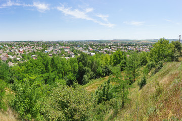 Fototapeta na wymiar View from the slope of a small Kuban city of Krymsk in the Krasnodar region
