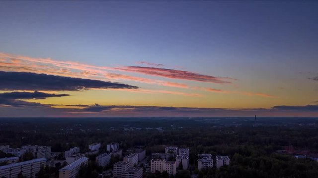 A drone time lapse of a summer night sunset at 11pm, Helsinki, Finland