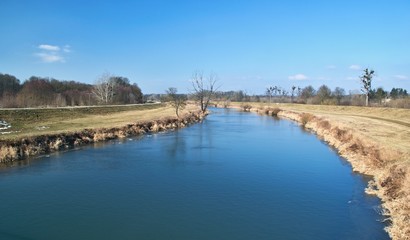 Wide river in the open countryside