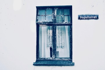 Charming navy blue and white window spotted on the streets on Reykjavik, Iceland.