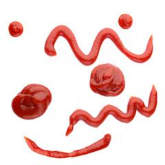 Red ketchup splashed on the white surface