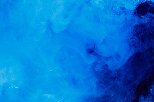 Splash water abstract. Blue ink background