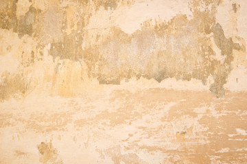 Old vintage grungy plaster painted wall texture background