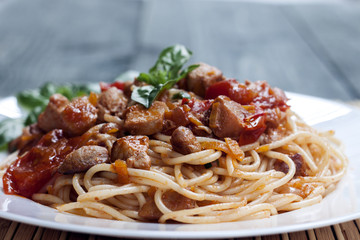 Spaghetti in tomato sauce with chicken