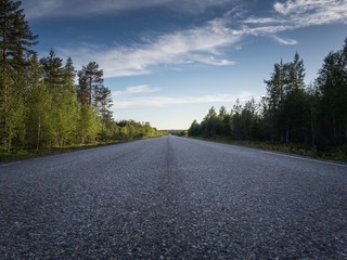 Naklejka premium Empty road in Northern Finland