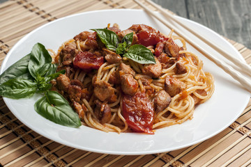 Spaghetti in tomato sauce with chicken