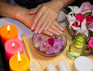 Obraz na płótnie Canvas Relaxing spa for hands. Natural cosmetics, creams, oils and scrubs.
