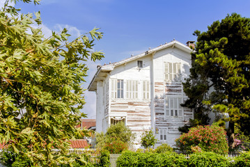 Fototapeta na wymiar Istanbul, Turkey, 3 August 2012: White Mansion at Buyukada, Princes Islands district of Istanbul