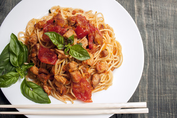 Spaghetti in tomato sauce with chicken