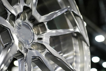 Close up of rims from a sports car. The concept of tuning the wheels of a car. Car wheel.
