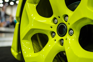Close up of rims from a sports car. The concept of tuning the wheels of a car. Car wheel.