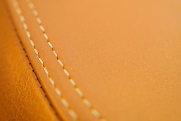 Leather upholstery for the motorcycle seat close-up.