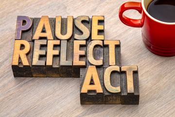 pause, reflect, act concept - word abstract in wood type