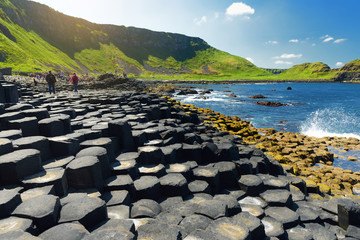 Giants Causeway, an area of hexagonal basalt stones, created by ancient volcanic fissure eruption, County Antrim, Northern Ireland. - obrazy, fototapety, plakaty