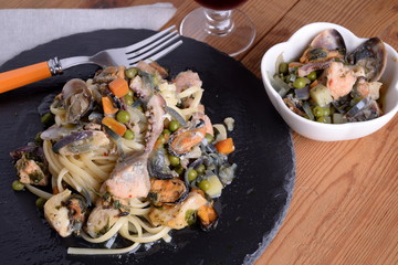 Linguine pasta with fish molluscs and crustaceans and aromas 