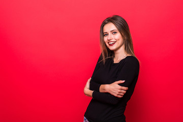 Young brunette woman get cold isolated on red background