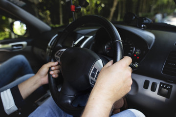 Man driving a family car