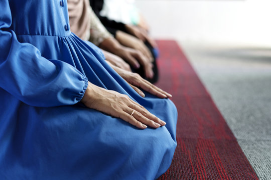 Muslim prayers in Tashahhud posture