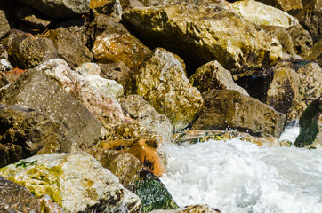 Amazing sea with blue summer wave and rocks, relaxing view of rocks and water