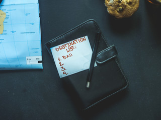 overhead travel concept on dark black background