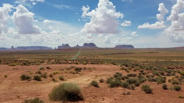 Classic Monument Valley panorama from the Forest Gump stretch of the US Route 163, North of the Arizona-Utah border, USA
