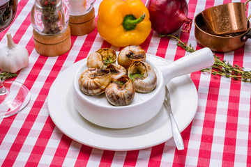 Burgundy grape snails