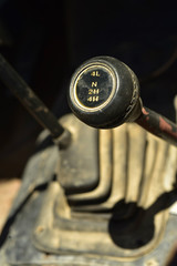 gear shift  and dashboard gauges in vintage land vehicle