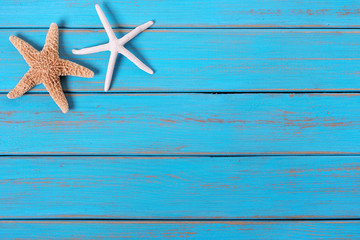 Starfish old worn blue beach wood deck background border