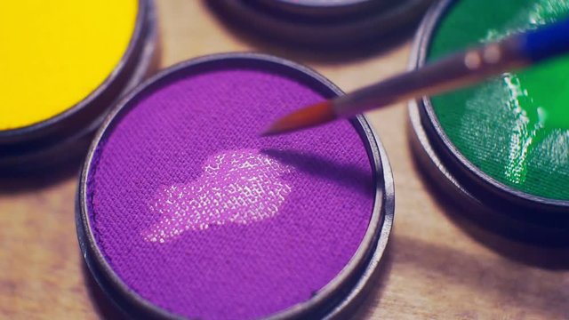 colorful jars with aquagrim closeup