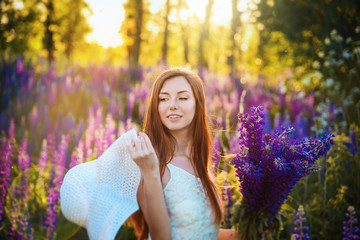 Girl posing in field flowers