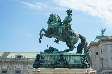 Obraz premium Statue of Emperor Joseph II with horse lifting two leg in front of Hofburg Palace Vienna Austria.