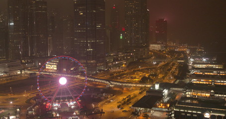 Night city, skyscrapers and buildings with lighting.