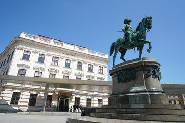 Obraz premium Front view of the Albertina building. Franz Joseph I monument near Albertina Museum, Vienna.