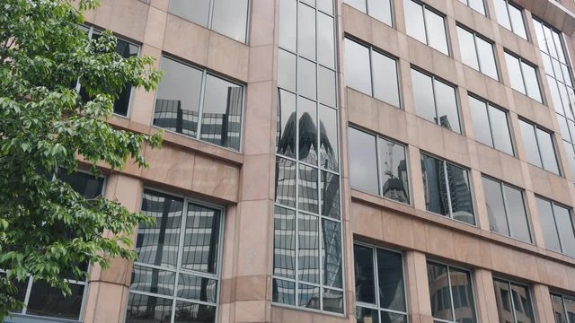 Reflection of buildings in Office Building Windows.