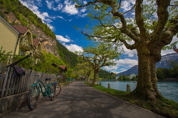Parked bicycles next to river