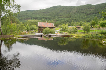 Obraz premium Old houses in ecomuseum in Norway