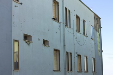Facade of an abandoned building (Fano, Italy)