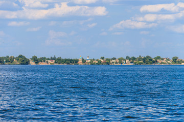 Naklejka premium View of Nikopol town from Kakhovka reservoir, Ukraine