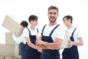 Workers unload boxes.
