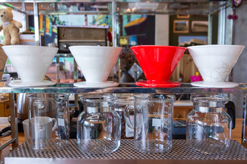 Drip coffee set on wooden table